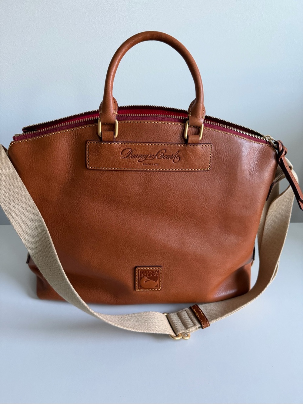 Dooney & Bourke Tan Brown Leather Messenger Bag with Red Trim